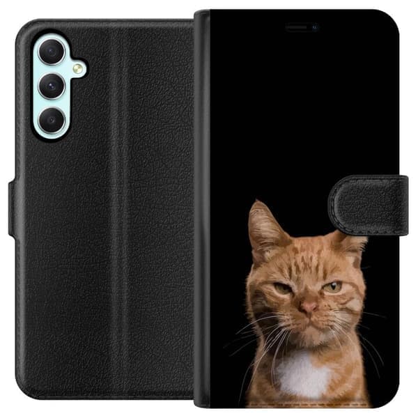 Yhteensopiva Lompakkokotelo Samsung Galaxy A34 Lähikuvaa oranssista kissasta mustaa taustaa vasten voimakkaalla kontrastilla ja ilmaisevalla katseell