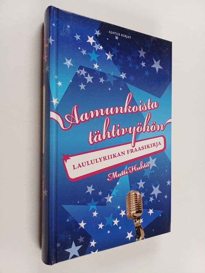 Matti Huhta : Aamunkoista tähtivyöhön : laululyriikan fraasikirja